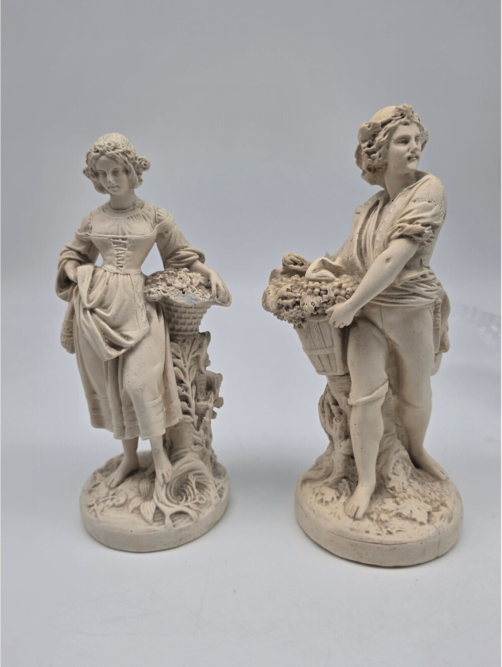 Pair of Vintage Ceramic Figurines of Woman and Man with Flower Baskets